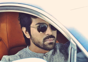 Ram Charan in his swanky Aston Martin car Photos